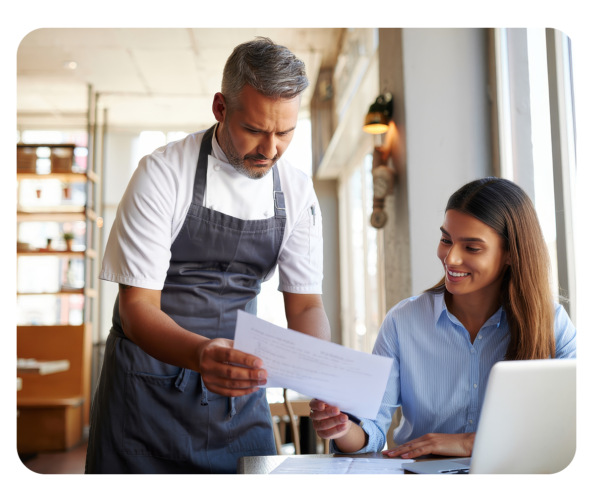 Staff working on laptop.