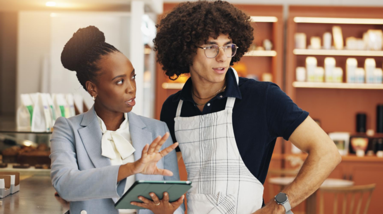 Restaurant manager reviewing restaurant KPIs